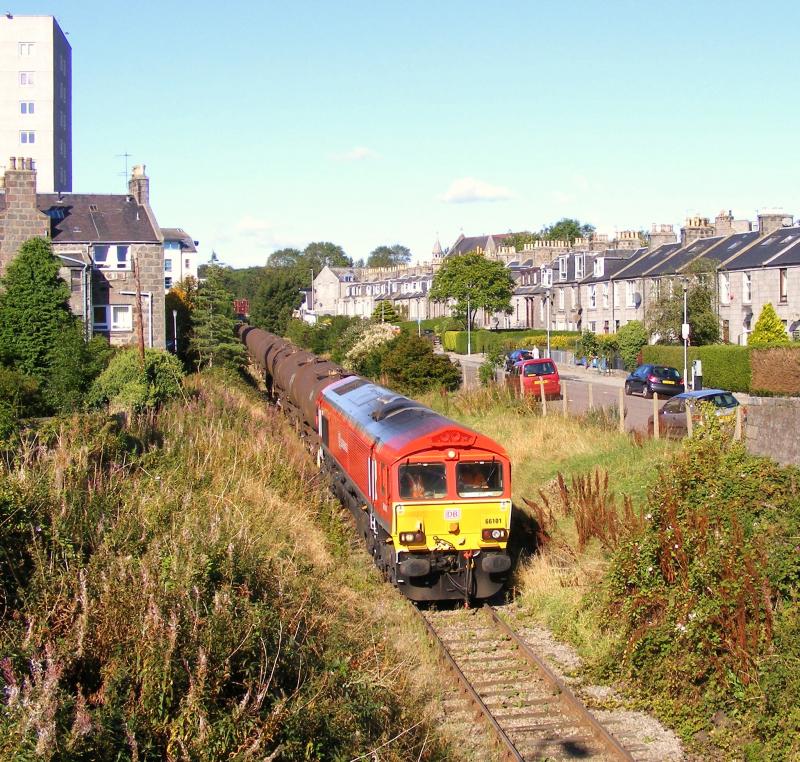 66101: 66101 stolls down Aberdeen Waterloo branch with 6A31 from Mossend Photo of 66101