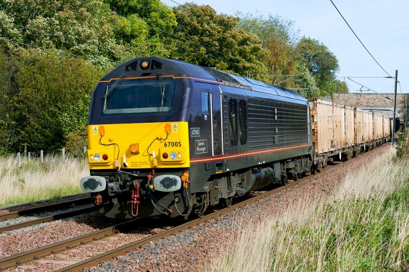 67005 on the bins: 67005 passes the back of Redhouse Castle with 6B46 Oxwellmains - Powderhall empty Photo of 67005 on the bins