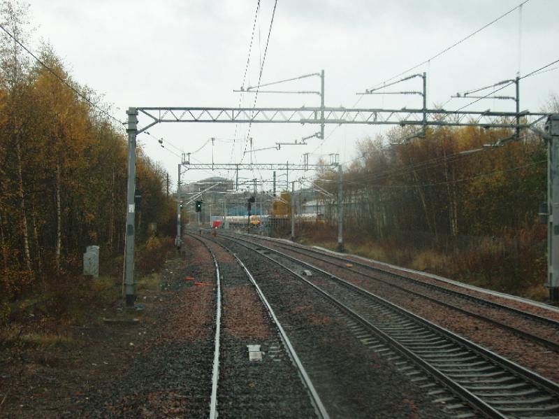 burma11.jpg: Approaching Shields Jn from the Paisley direction. The track on the left is the Up Through Terminus line, with the Up and Down lines to Paisley Gilmore Stree adjacent. The EMUs are in Shields Road depot. Photo of burma11.jpg