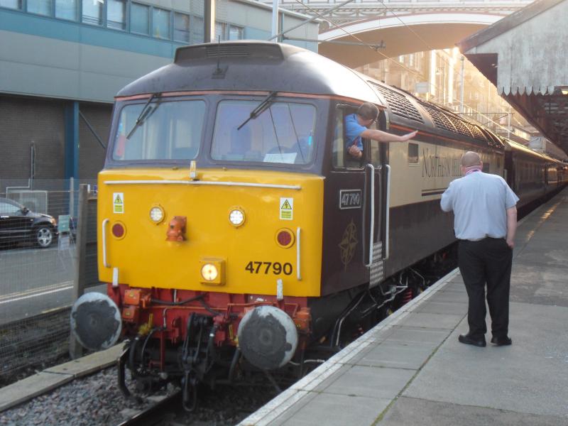 Driver flailing?!: This driver likes his 47 so much he shall flail to it and his posh passengers ;) Photo of Driver flailing?!