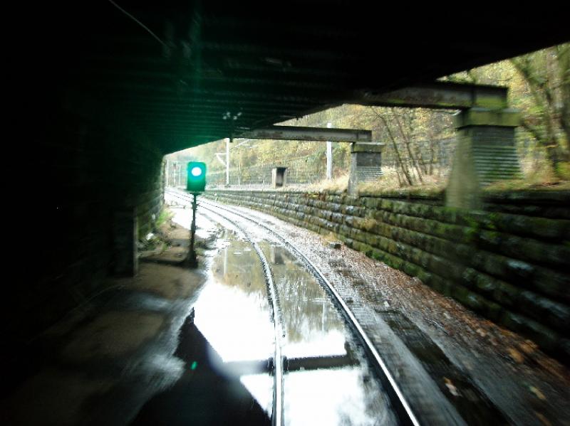 burma16.jpg: The Burma Road underneath the bridge carrying the Glasgow Central tracks is concrete slab track, with some drainage problems! The Clydesdale lines can be seen beyond the signal. Photo of burma16.jpg