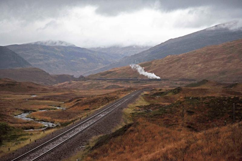 Climb to Corrour: 45407 piloting 44871 on the climb from Loch Treig to Corrour Summit, with the Jacobite ECS from Fort William to Carnforth, banked by 37 516 on Monday 31 October 2011. Photo of Climb to Corrour