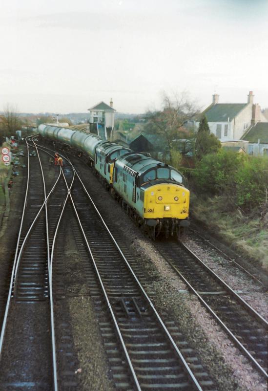 37184 & 111(I think!) with the Bishopbriggs Tanks at Grangemouth Junc.: 37184 & 111(I think!) with the Bishopbriggs Tanks at Grangemouth Junc. Photo of 37184 & 111(I think!) with the Bishopbriggs Tanks at Grangemouth Junc.