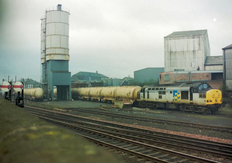 37144 shunting soda-ash tanks at Larbert.: 37144 shunting soda-ash tanks at Larbert. Photo of 37144 shunting soda-ash tanks at Larbert.