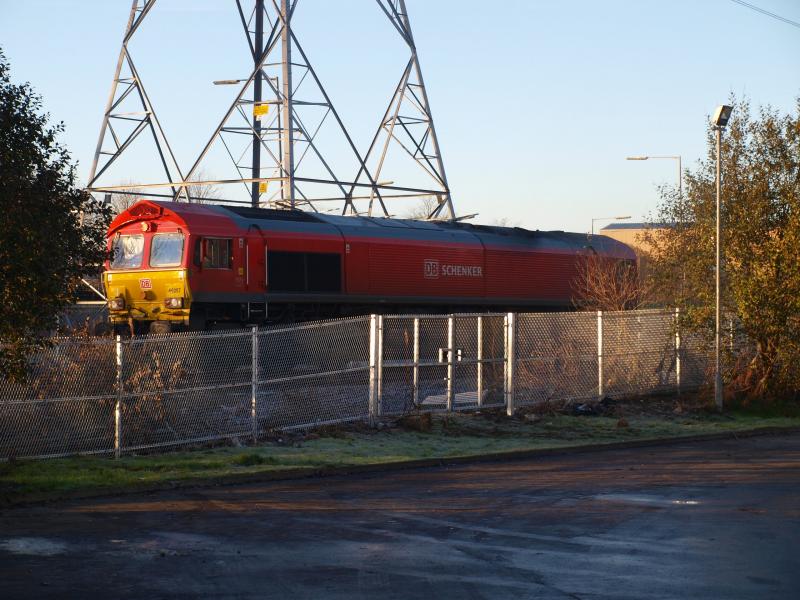 Riccarton - 07-11-2011: DB Schenker 66097 waits at riccarton for its train of oil tankers to be unloaded. Photo of Riccarton - 07-11-2011