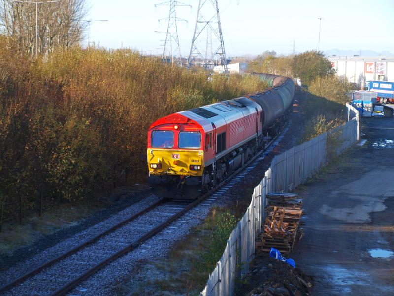 Kilmarnock - 07-11-2011: DB Schenker 66097 departs from Riccarton with empty oil tankers, returning to Grangemouth. Photo of Kilmarnock - 07-11-2011