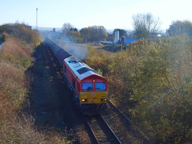 Kilmarnock - 07-11-2011: DB Schenker 66097 departs Kilmarnock with the Riccarton - Grangemouth empty oil tankers. Photo of Kilmarnock - 07-11-2011