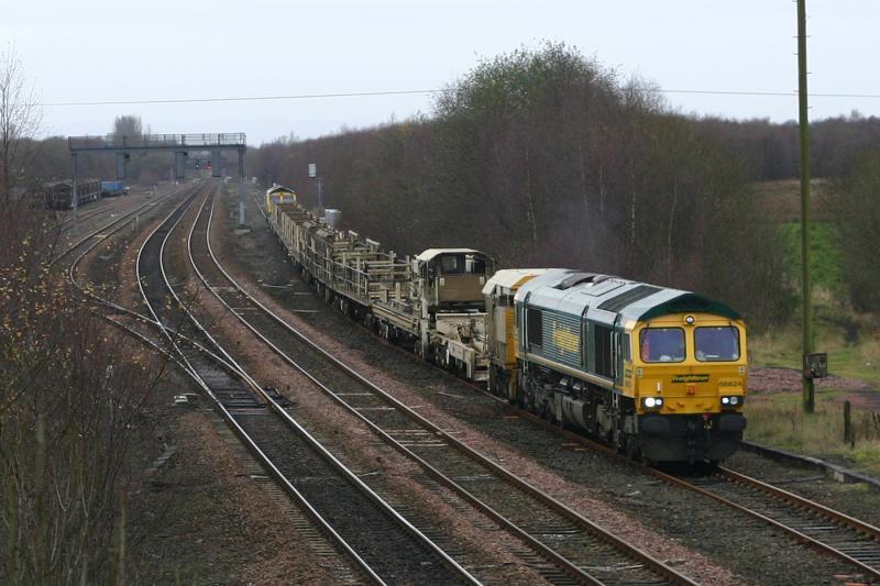 66624: 66624 and 66625 on rear leave Cadder loop with Bridge of Orchy - Millerhill CWR empties on Sunday November 25 2007 Photo of 66624