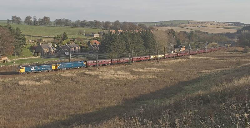 1Z47 at Grantshouse: Class 50's, 50049 and 50044 make a fine sight as they head the 1Z47 Edinburgh Explorer II past Grantshouse earlier this morning in superb weather. 57001 was bringing up the rear. Photo of 1Z47 at Grantshouse