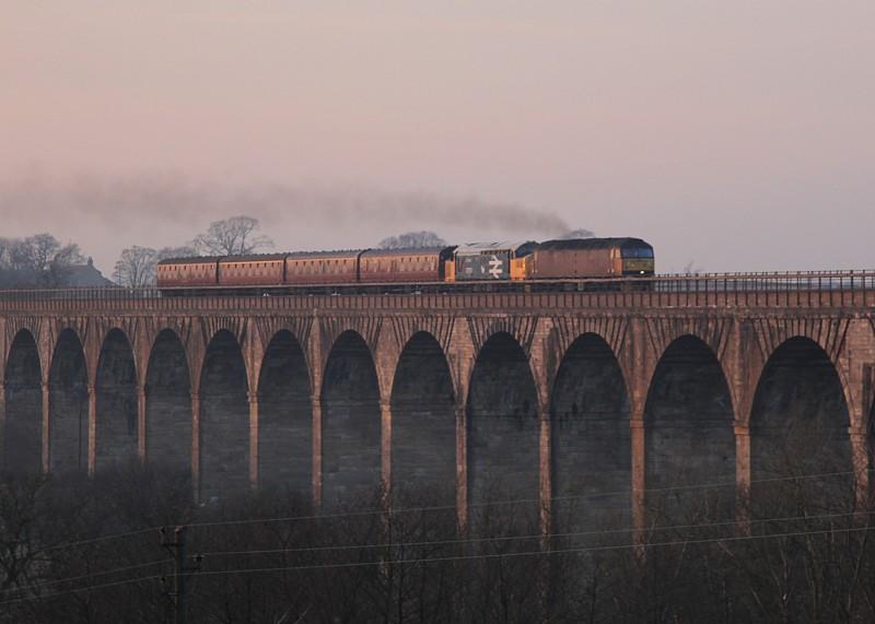 37175 & 47760 on the E&G: 47760 with 37175 & four SRPS coaches in tow head across Almond Viaduct approaching Linlithgow, on the way to Craigentinny for tyre turning. Sunday 15th January 2012 Photo of 37175 & 47760 on the E&G