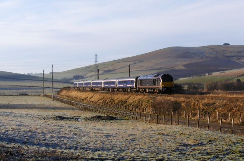 67006 5A25: 67006 approaches Huntly Home Signals working 5A25 10:40 Aberdeen - Inverness Empty Bedz Stock 15-01-12 Photo of 67006 5A25