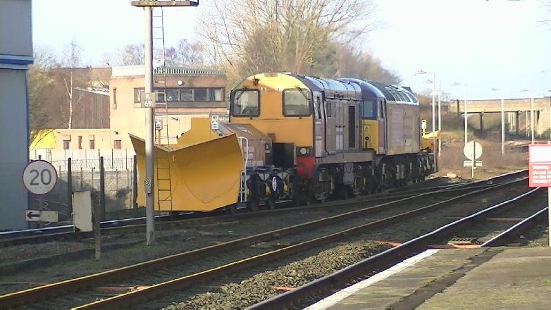 20303+57009 on 7Z57 12 Jan 2012: Surprise visit of a class 20 Chopper to Kilmarnock for the first time in years! In tandem with 57009 it takes 7Z57 to Carlisle with 2 snow ploughs ADB975580 + ADB975581 on either end. Photo of 20303+57009 on 7Z57 12 Jan 2012