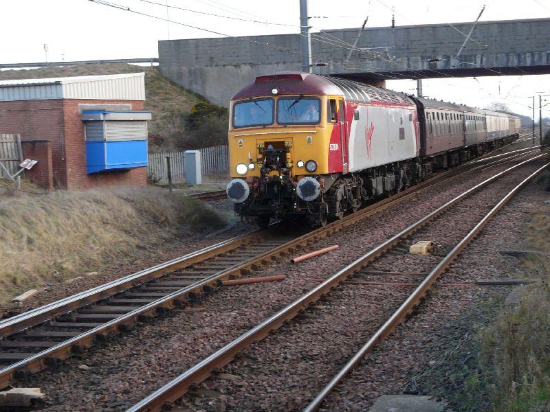 57304 on 5Z60 leaves Barassie 3-2-12: Virgin Thunderbird 57304 Gordon Tracey leaves Barassie on the ECS of GBRf worked 334 drag, returning to Glasgow Works Photo of 57304 on 5Z60 leaves Barassie 3-2-12