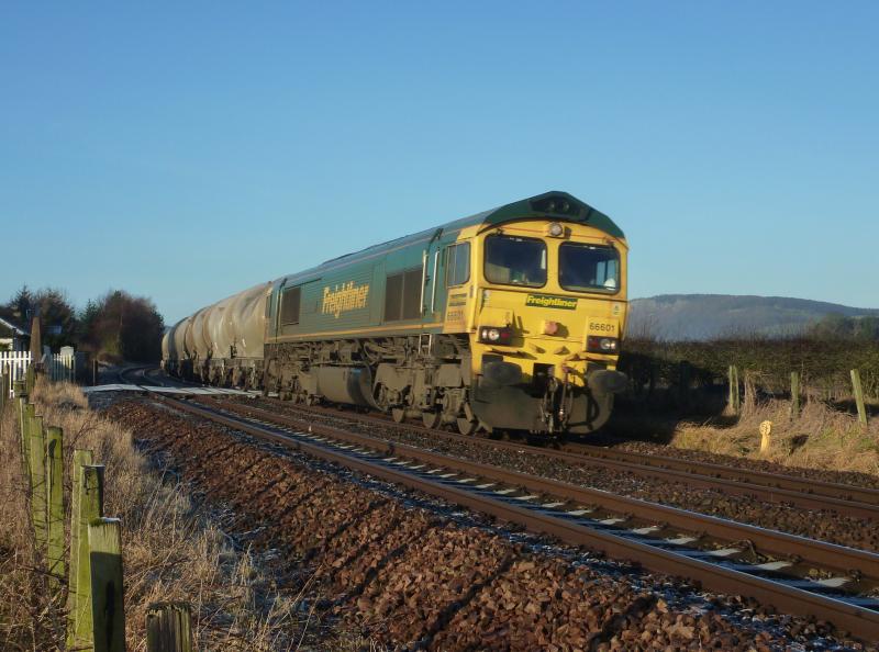 66601 6A65 Inchyra:
66601 'The Hope Valley' on 6A65 Oxwellmains to Aberdeen passes the closed level crossing and newly found location at Inchyra between Perth and Errol on Monday 6th February 2012 Photo of 66601 6A65 Inchyra