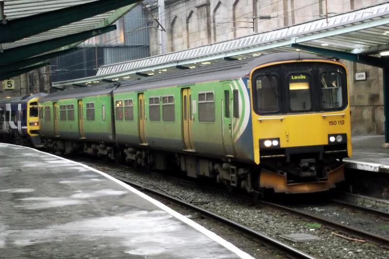 150112 at Carlisle: Now working for Northern Trains, but still wearing the livery of its previous owner Centro 150112 waits at Carlisle on Satrurday 11th February 2012. Forming the 1550 to Leeeds Photo of 150112 at Carlisle