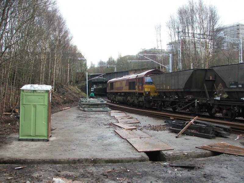 66171 On Burma Road: Tue 11 Dec 07 Assumed 7G16 Hunterston Longannet
OHL Masts in position. Track work materials ready for the Christmas closure Photo of 66171 On Burma Road