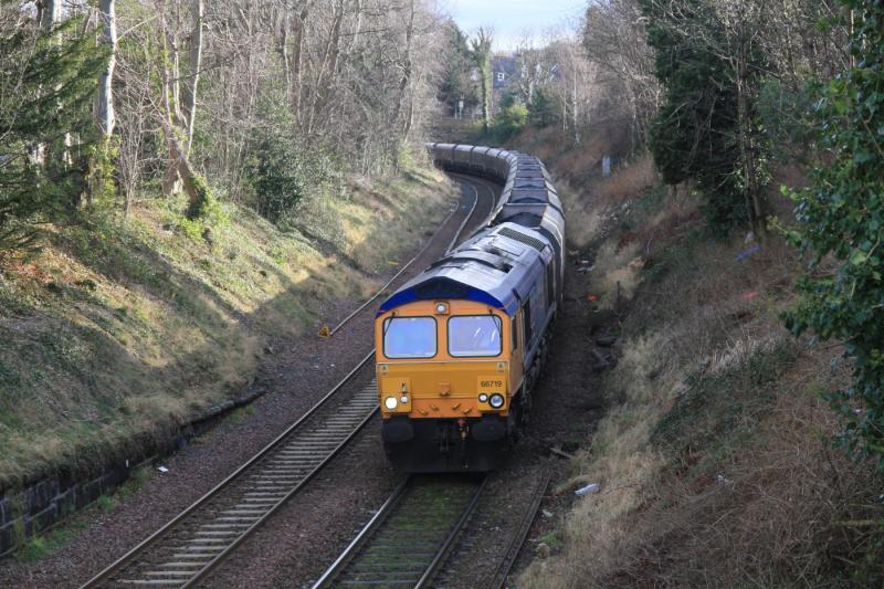 66719 west of Hawkear Central: 66719 on 4S81 02.45 Ferrybridge P Stn to Hunterston approaching the closed station at Morningside on 21-02-2012. Photo of 66719 west of Hawkear Central