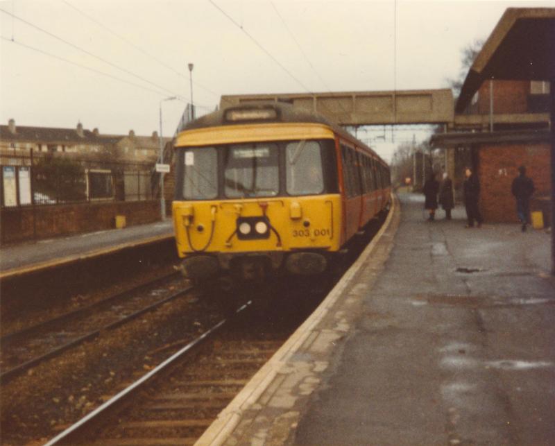303 001 calls at Garrowhill: 303 001 calls at Garrowhill with a train for Helensburgh. (02.02.85) Photo of 303 001 calls at Garrowhill