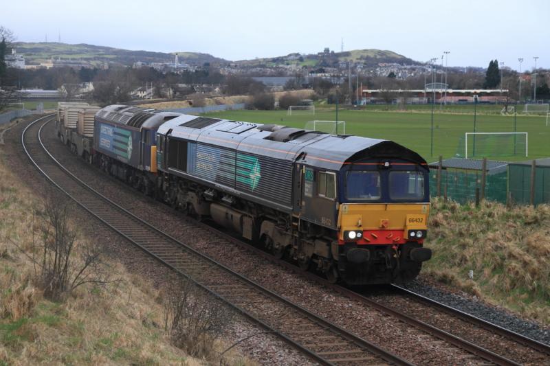 Thursday Torness Flasks: 66432 + 57009 on the 06.42 Carlisle to Torness power Stn passing Peffermill Playing Fields on the Edinburgh Sub 23-02-2012 with the same 3 flasks as the previous day Photo of Thursday Torness Flasks