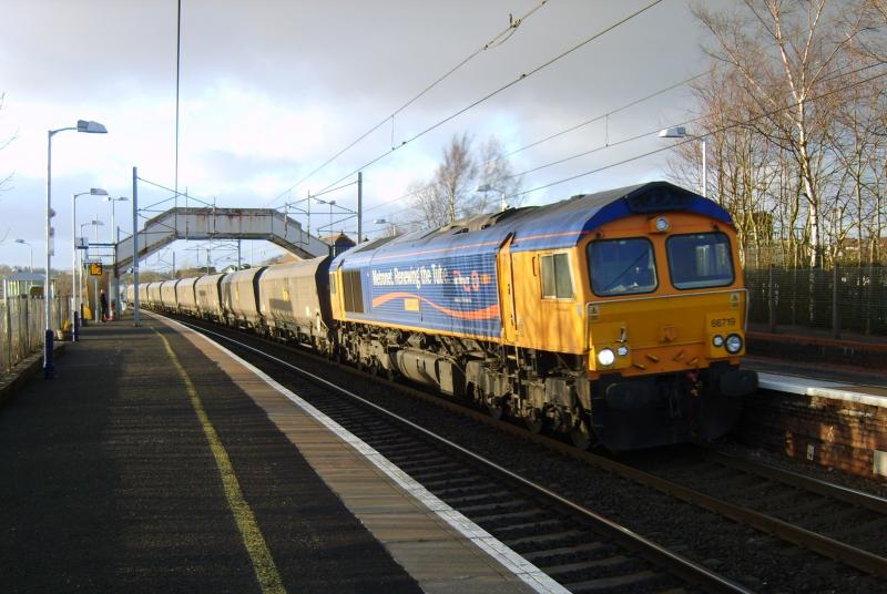 GBRF Coal. 24th February 2012: 66719 Hunterston to Ferrybridge passes Carluke on time and in the sunshine! Photo of GBRF Coal. 24th February 2012