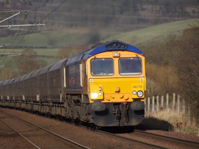 Metro Power: Gbrf 66719 'Mertoland' powering up the hill towards West Kilbride station working the 6E05 Hunterston to Ferrybridge coal train. Photo of Metro Power