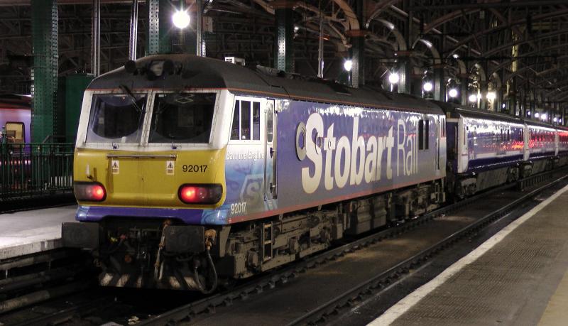 Stobart Sleeper:
Stobart Rail 92017 'Bart The Engine' stands in Glasgow Central on the 27th February 2012 having worked the 5M11 2112 Polmadie to Glasgow Central empty sleeper stock Photo of Stobart Sleeper