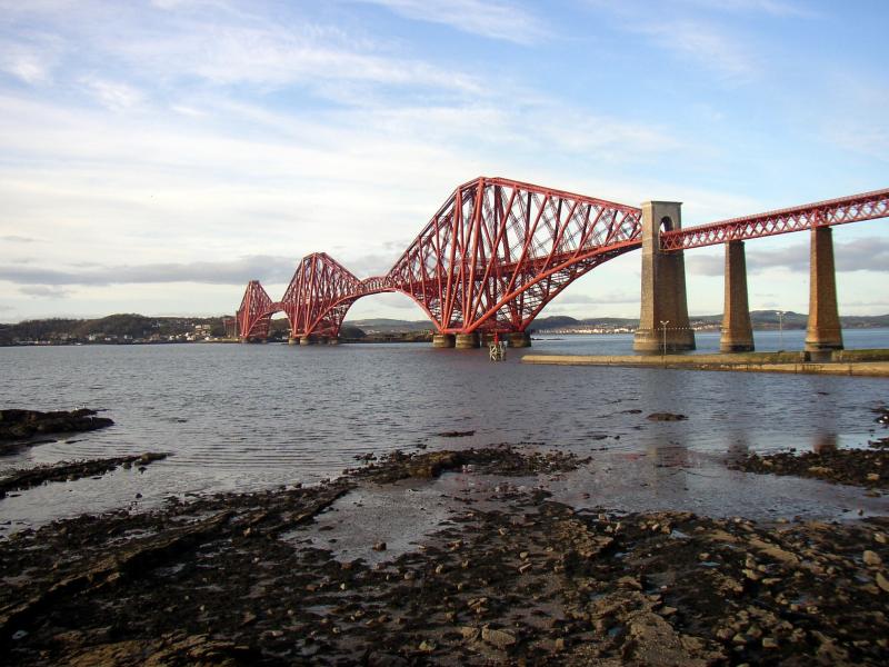 The Forth Bridge: Finally free of scaffolding and sheeting, The Forth Bridge shines in its new gloss red paint Photo of The Forth Bridge