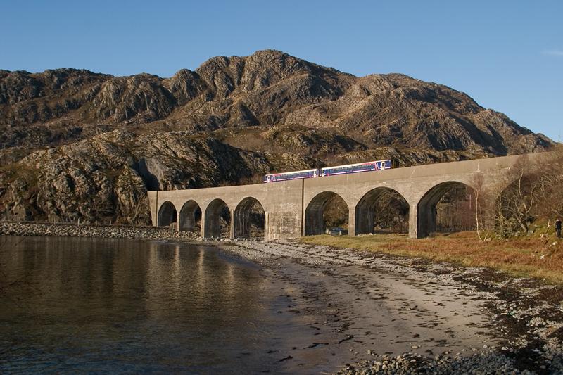 156499 Loch Nan Uamh viaduct: 156499 clatters across Loch Nan Uamh viaduct on 1Y43 14:21 Crianlarich - Mallaig ScotRail service in the early evening sun, Thu 22nd March 2012 Photo of 156499 Loch Nan Uamh viaduct