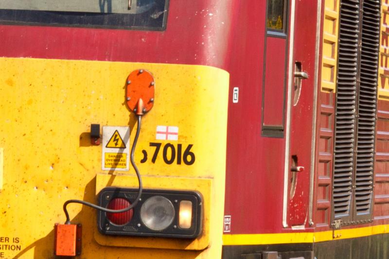 Close up of Georges Cross and Neville Hill sticker on 67016: 67016 carries a George Cross and Neville Hill depot sticker whilst working 6K01 Greenhill - Mossend on 1st April 2012 Photo of Close up of Georges Cross and Neville Hill sticker on 67016