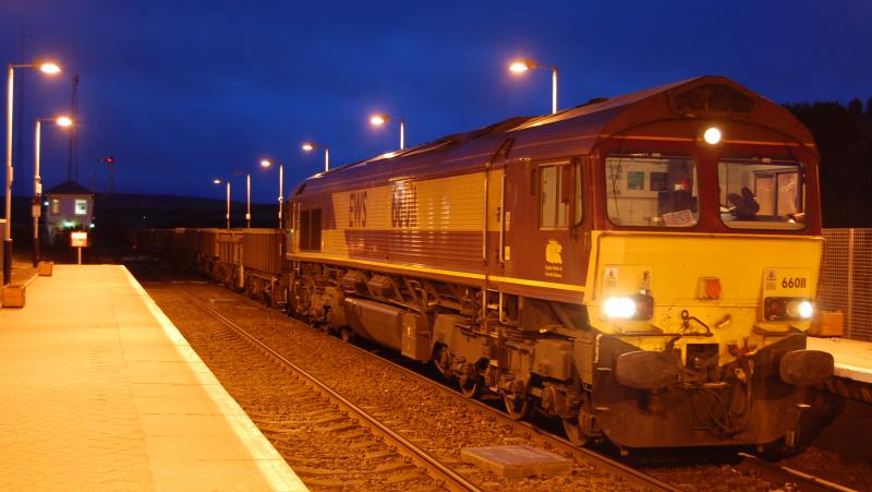 size 10 by the looks of them: THe driver of 6K13 Brownhill to Carlisle takes a well earned rest as he waits for the train in front to clear the long section to Holywood. Photo of size 10 by the looks of them