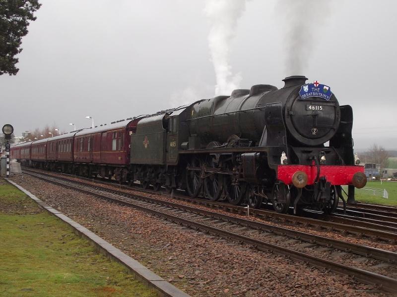 46115 departs Kingussie.: 46115 'Scots Guardsman' blasts away
from Kingussie with 1Z42, the 10:51
Inverness - Glasgow Central leg of the
'Great Britain V' railtour. Photo of 46115 departs Kingussie.