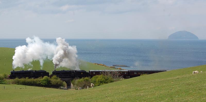 Paddys milestone. The milestone post with no number: Black 5s 45305 and 45407 tackle Glendoune Bank south of Girvan while working the GBV railtour Photo of Paddys milestone. The milestone post with no number