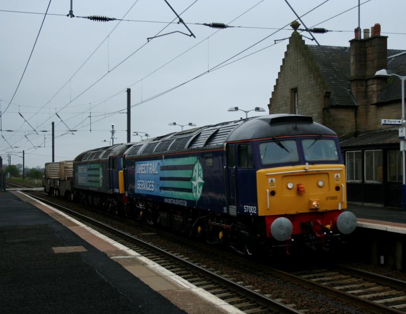 Hot Train: 57002 + 57004 pass Kirknewton with 6S43 Carlisle -- Torness flasks Photo of Hot Train