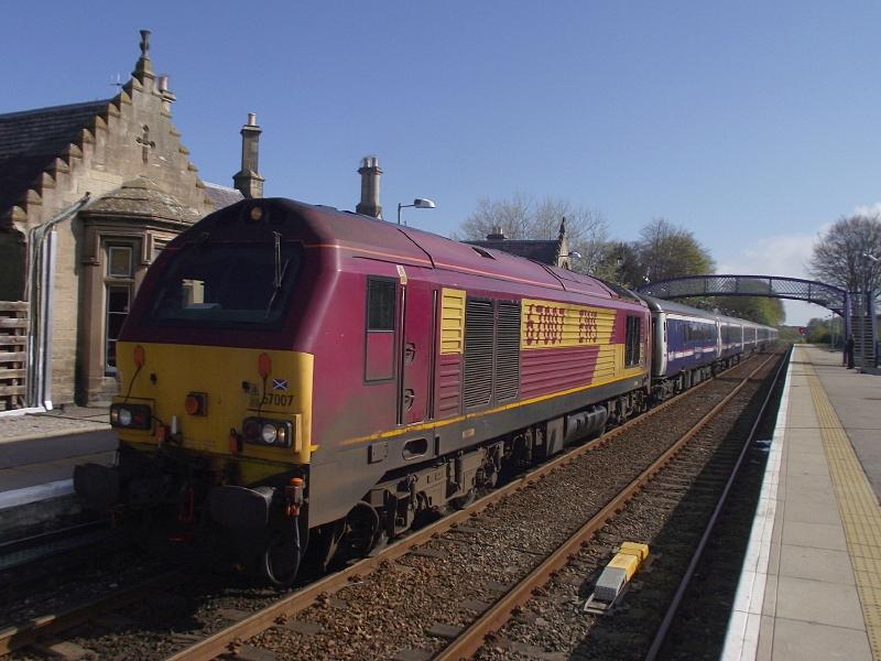 67 007 at Nairn - 01st May 2012: With the Highland Main line blocked at Slochd, various services were re-routed via Aberdeen.
67007 passes Nairn with 1S25, the diverted
04:15 Edinburgh - Inverness Caledonian Sleeper. Photo of 67 007 at Nairn - 01st May 2012