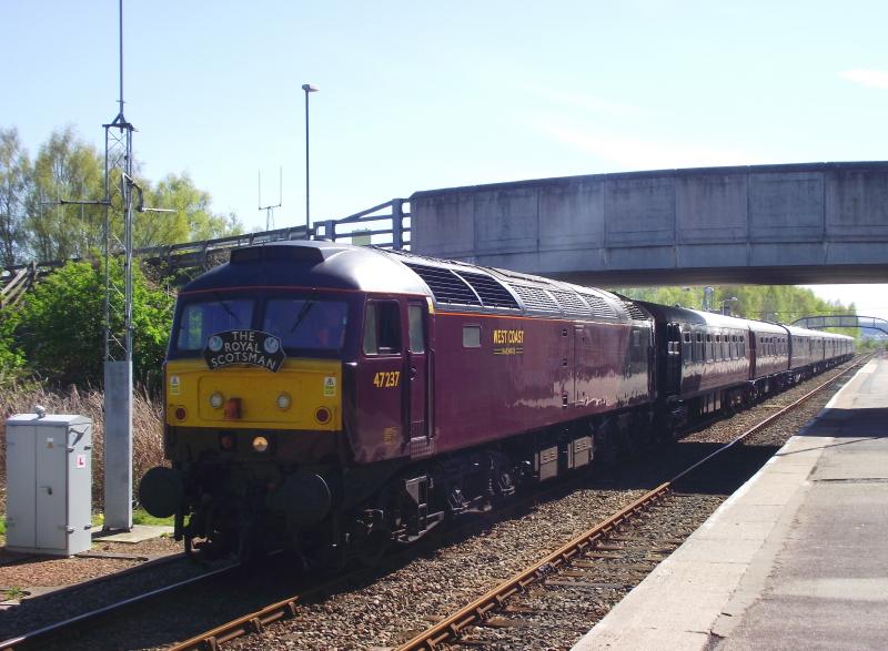 47 237 at Dingwall 01st My 2012: One of very few trains to depart from Plat.2 at Dingwall heading North, 47237 heads for Kyle with 1H80, the 10:00 'Royal Scotsman' from Keith. Photo of 47 237 at Dingwall 01st My 2012
