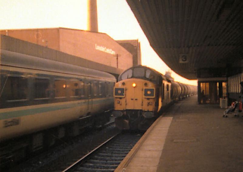 37011 with the Grangemouth - Jarrow tanks at Haymarket.: 37011 with the Grangemouth - Jarrow tanks at Haymarket. Photo of 37011 with the Grangemouth - Jarrow tanks at Haymarket.