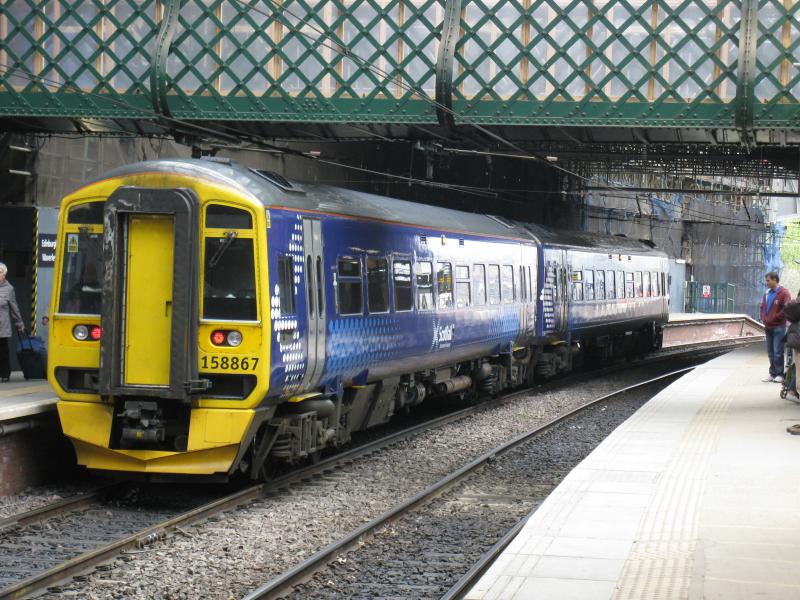 Class 158: Class 158 at Edinburgh Waverley in the latest saltire livery on a service to Newcraighall on Monday 21 May 2012. Photo of Class 158