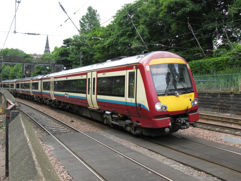 Class 170: Class 170 at the foot of Edinburgh Castle mound. Photo of Class 170