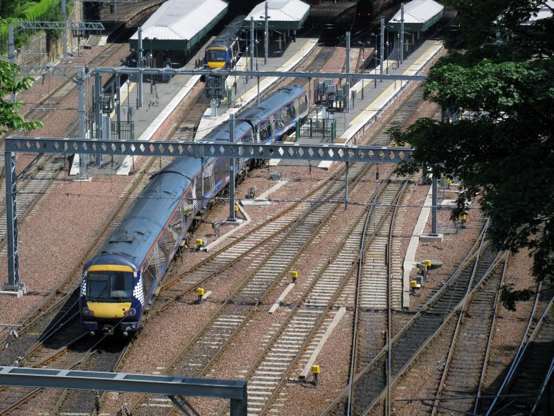 Class 170: Class 170 approaching Edinburgh Waverley in the latest Saltire livery. Photo of Class 170