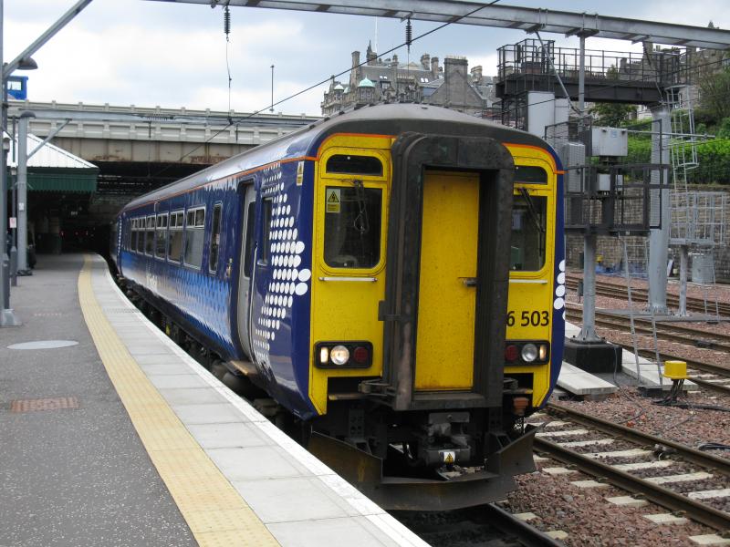Class 156: Class 156 departing Edinburgh Waverley in the latest Saltire livery. Photo of Class 156