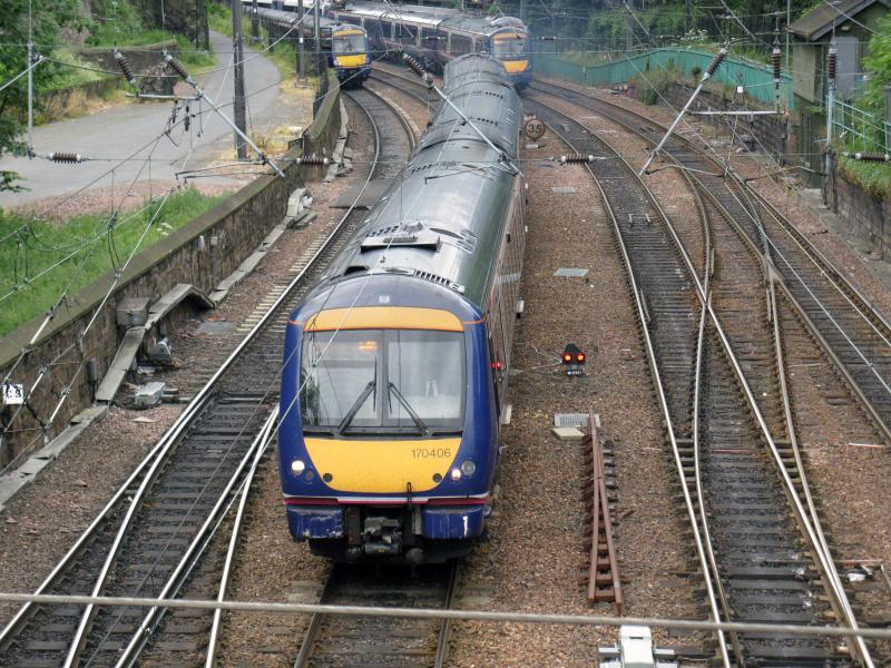 Class 170: Class 170 passing the foot of Edinburgh Castle mound. Photo of Class 170