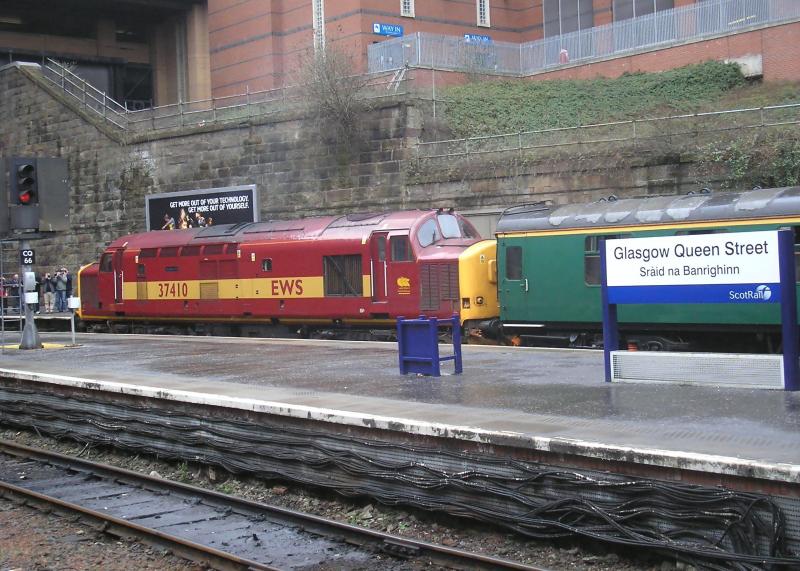 37410: With 37406 at the buffers, 37410 awaits departure from Glasgow Queen Street on 10.02.07, while working the McBuffer Puffer tour around Glasgow. Photo of 37410