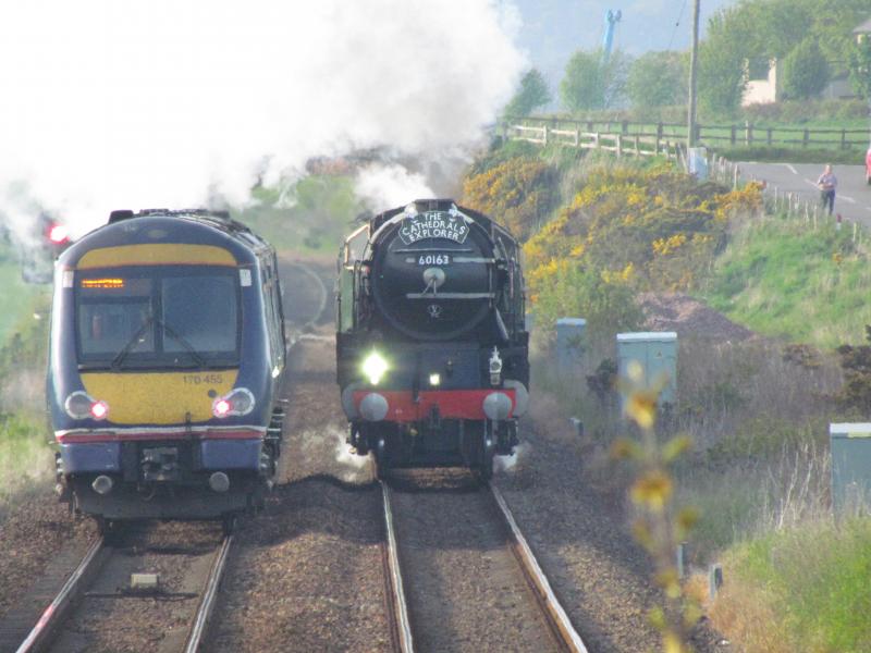 60163 climbing the hill at Usan Jcn: The old and the new. 60163 climbing up the hill at Usan Jcn passing 170 455 waiting access to the single line. Photo of 60163 climbing the hill at Usan Jcn