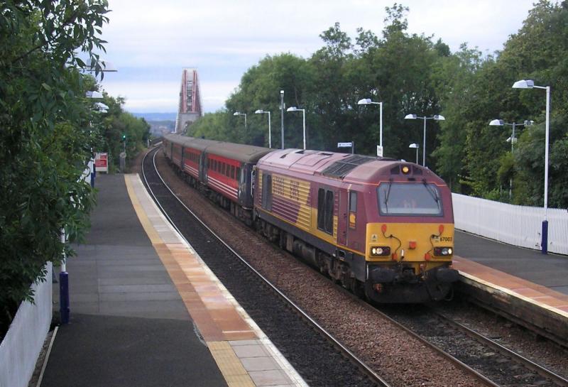 67003: 67003 comes off the Forth Rail Bridge and through Dalmeny station on 18.07.07, while working the 1Z24 Carnoustie - Edinburgh Golf-Ex. Photo of 67003