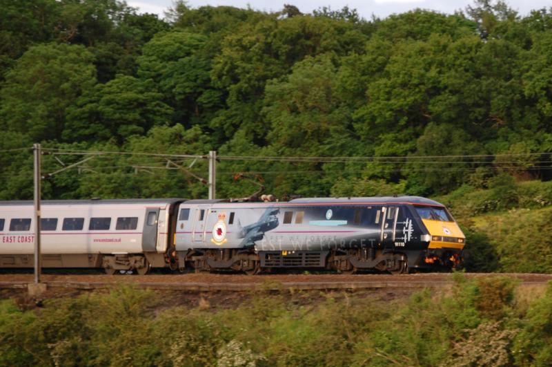 91110 BOBMF heads West: 91110 Battle of Britain Memorial Flight, heads west to Glasgow on 1S23 1530 ex King's Cross near Whitelaw LC. Tuesday 12/06/2012 at 2028 Photo of 91110 BOBMF heads West