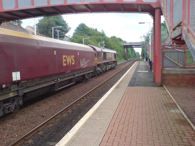 66162 at Baillieston: 66162 passing Baillieston Station on the R&C. (11.06.12) Photo of 66162 at Baillieston
