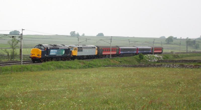 37612 and 56312, 5Z56: 37612 drags failed 56312 on 5Z56 Kilmarnock to Laira just north of Shap with a flail from commander boff. Photo of 37612 and 56312, 5Z56