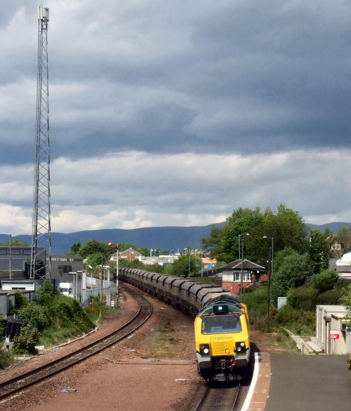 Photo of 70003 passes Larbert with 4C07 for Renstrie. 24/5/2010.