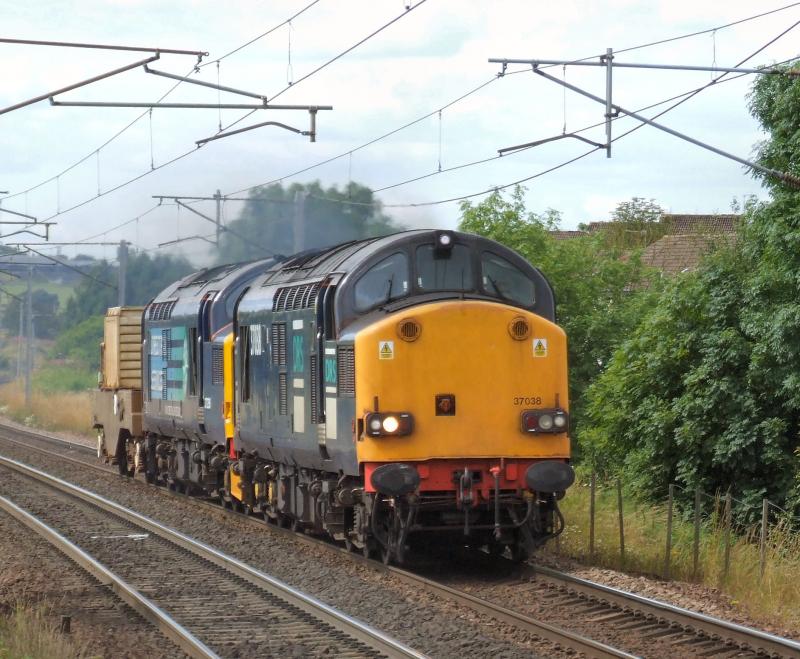 37038 & 259 power through Carluke with 6M22 for Sellafield.: 37038 & 259 power through Carluke with 6M22 for Sellafield. Photo of 37038 & 259 power through Carluke with 6M22 for Sellafield.