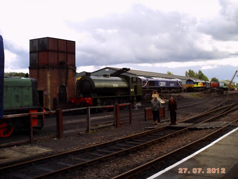 1 steam, 4 diesel: 75254 is surrounded by a small shunter, 2 class 66s and 20020 just visible. Photo of 1 steam, 4 diesel